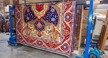 colorful-area-rug-hang-drying